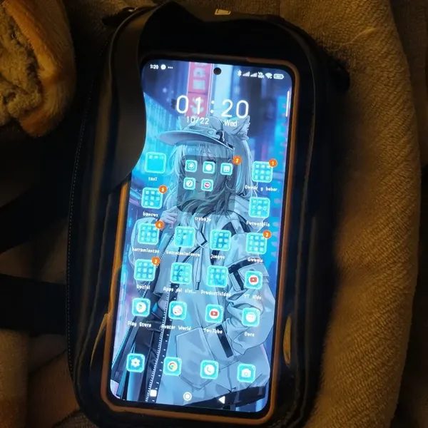 Ridgeline Pilot top tube phone bag with a phone in the touchscreen window, photographed by a verified buyer