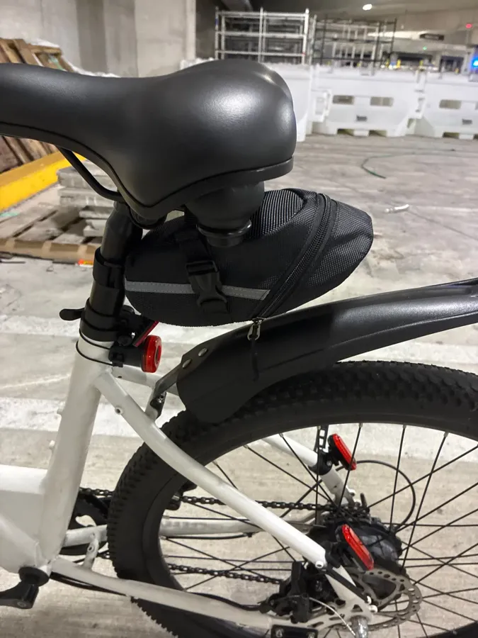 Verified buyer photo of the black wedge saddle bag mounted under a saddle